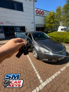 Vauxhall Insignia unlocked at Magna Park near Lutterworth after keys were locked in the boot